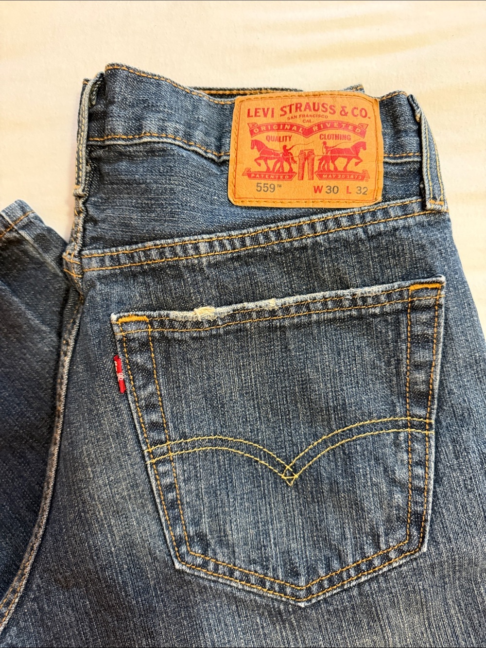 Levi's 559 Relaxed Straight Jeans - Dark Blue Denim with Tan Patch